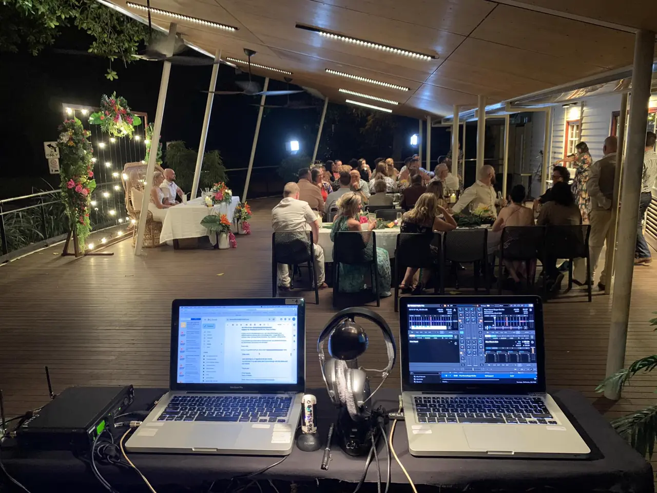 Speakers and lighting stands set up in a function room