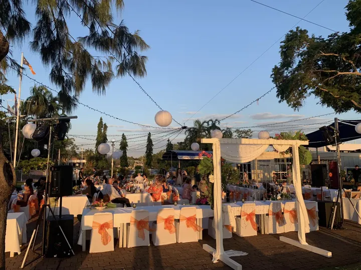 Beachside reception tables at sunset
