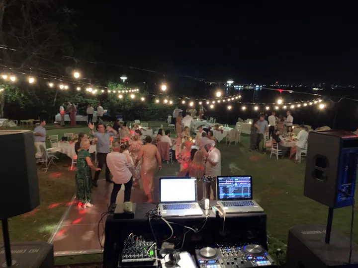 Outdoor dance floor lit up at night