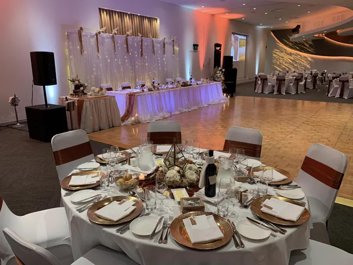Reception room with purple uplighting